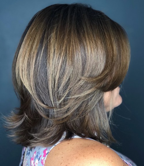 Medium Feathered Cut With Swoopy Bangs