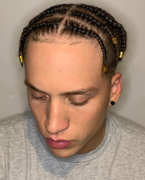 Middle part Braided Hairstyle for Men