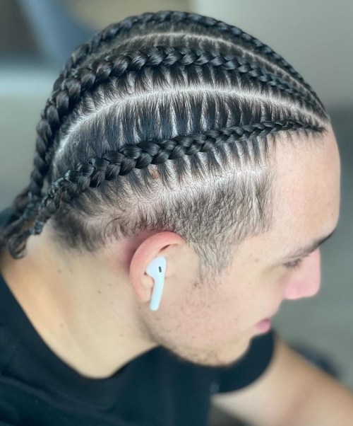 Braids into Low Men Bun with Undercut Temples