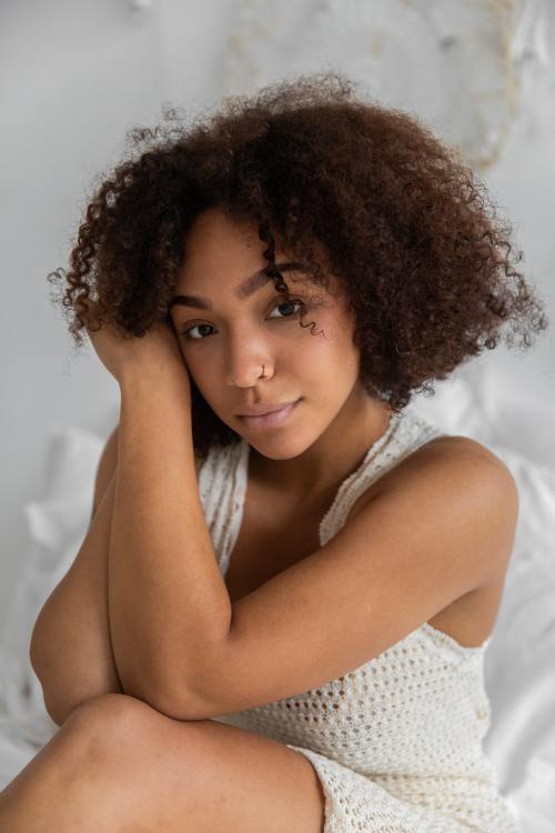 Woman Touching Her Natural Afro Hair