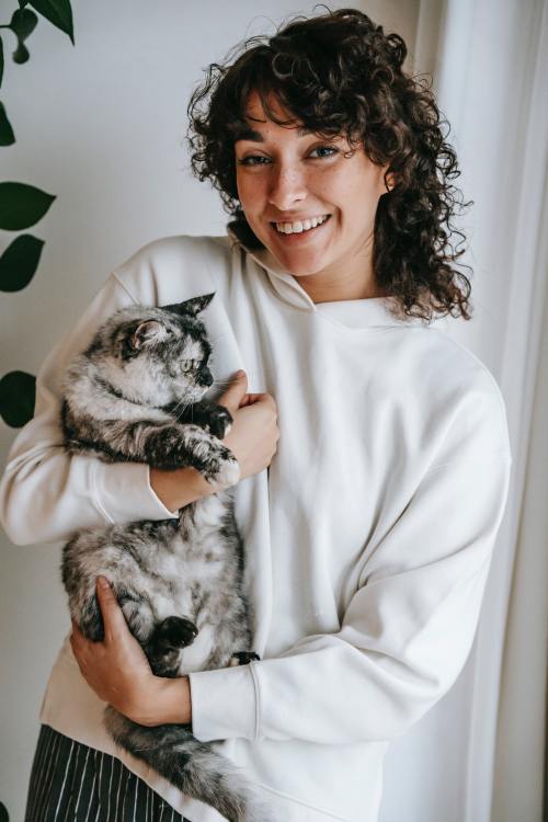 Women with Curly Shag Haircut and Bangs 